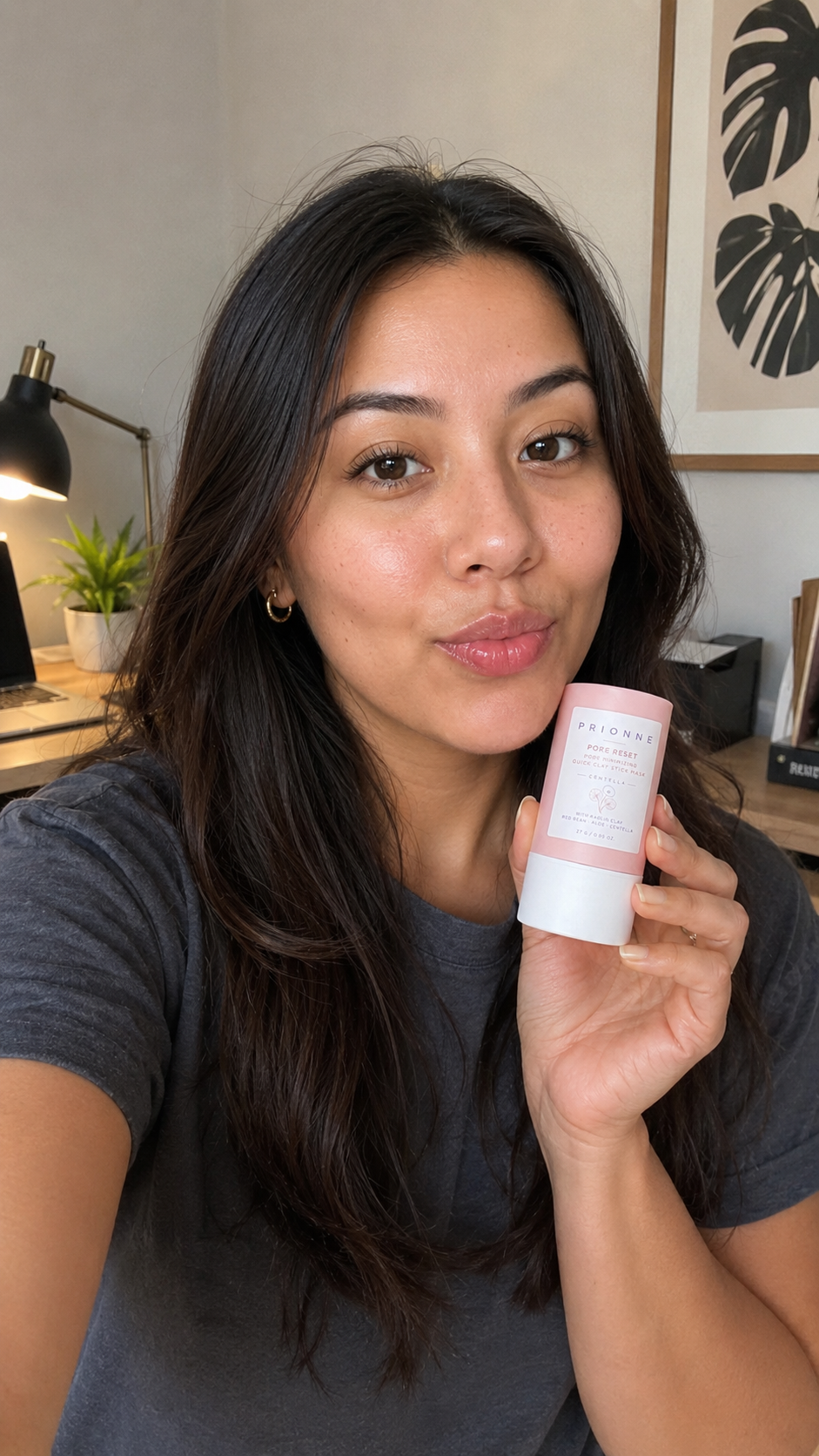 Female customer at home office holding Prionne clay mask stick